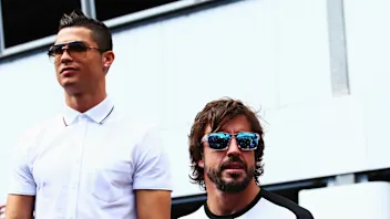 MONTE-CARLO, MONACO - MAY 24:  Real Madrid footballer Cristiano Ronaldo meets Fernando Alonso of