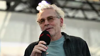 SUZUKA, JAPAN - MARCH 27: Jacques Villeneuve on stage prior to practice ahead of the F1 Grand Prix