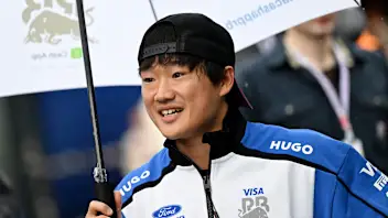 ZANDVOORT, NETHERLANDS - AUGUST 21: Yuki Tsunoda of Japan and Visa Cash App Racing Bulls arrives in