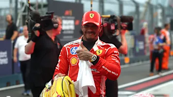 SINGAPORE, SINGAPORE - OCTOBER 10: Second placed Lewis Hamilton of Great Britain and Scuderia