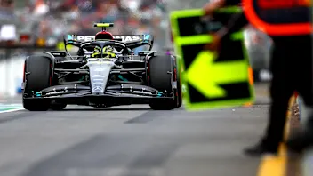 McLaren's Australian driver Oscar Piastri makes a pit stop during the first practice session of the