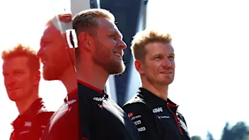 SPIELBERG, AUSTRIA - JUNE 29: Kevin Magnussen of Denmark and Haas F1 and Nico Hulkenberg of Germany