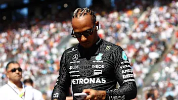 SUZUKA, JAPAN - SEPTEMBER 24: Lewis Hamilton of Great Britain and Mercedes prepares to drive on the