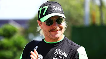 SINGAPORE, SINGAPORE - SEPTEMBER 22: Valtteri Bottas of Finland and Stake F1 Team Kick Sauber walks