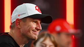 SINGAPORE, SINGAPORE - SEPTEMBER 22: 9th placed Nico Hulkenberg of Germany and Haas F1 speaks to