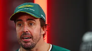 SINGAPORE, SINGAPORE - SEPTEMBER 22: 8th placed Fernando Alonso of Spain and Aston Martin F1 Team