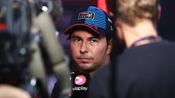 SINGAPORE, SINGAPORE - SEPTEMBER 21: 13th placed qualifier Sergio Perez of Mexico and Oracle Red