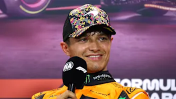 SINGAPORE, SINGAPORE - SEPTEMBER 21: Pole position qualifier Lando Norris of Great Britain and