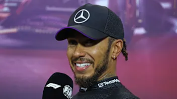 SINGAPORE, SINGAPORE - SEPTEMBER 21: Third placed qualifier Lewis Hamilton of Great Britain and