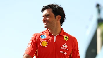 ABU DHABI, UNITED ARAB EMIRATES - DECEMBER 05: Carlos Sainz of Spain and Ferrari walks in the