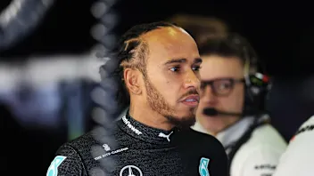 MELBOURNE, AUSTRALIA - MARCH 23: Lewis Hamilton of Great Britain and Mercedes looks on in the