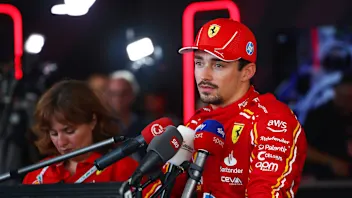 SPIELBERG, AUSTRIA - JUNE 29: 6th placed qualifier Charles Leclerc of Monaco and Ferrari talks to
