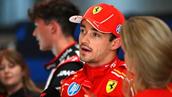 SAO PAULO, BRAZIL - NOVEMBER 01: 3rd placed qualifier Charles Leclerc of Monaco and Ferrari talks