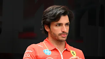 SAO PAULO, BRAZIL - OCTOBER 31: Carlos Sainz of Spain and Ferrari looks on in the Paddock during