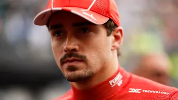 MONTREAL, QUEBEC - JUNE 09: Charles Leclerc of Monaco and Ferrari looks on, on the grid prior to