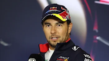 SHANGHAI, CHINA - APRIL 21: Third placed Sergio Perez of Mexico and Oracle Red Bull Racing attends