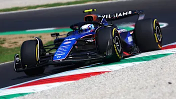 SINGAPORE, SINGAPORE - SEPTEMBER 22: Franco Colapinto of Argentina and Williams looks on in the