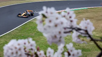 SUZUKA, JAPAN - APRIL 05: Sparks fly behind Oscar Piastri of Australia driving the (81) McLaren