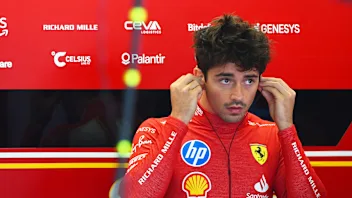 AUSTIN, TEXAS - OCTOBER 18: Charles Leclerc of Monaco and Ferrari prepares to drive in the garage