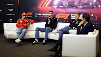 AUSTIN, TEXAS - OCTOBER 17: Carlos Sainz of Spain and Ferrari, Esteban Ocon of France and Alpine F1