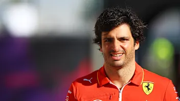 BAHRAIN, BAHRAIN - FEBRUARY 21: Carlos Sainz of Spain and Ferrari walks in the Paddock during day