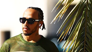 BAHRAIN, BAHRAIN - FEBRUARY 22: Lewis Hamilton of Great Britain and Mercedes looks on in the