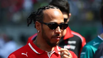 SHANGHAI, CHINA - MARCH 23: Lewis Hamilton of Great Britain and Scuderia Ferrari looks on from the