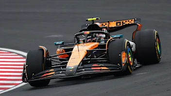 SUZUKA, JAPAN - APRIL 06: Lando Norris of Great Britain driving the (4) McLaren MCL39 Mercedes on