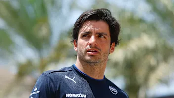 BAHRAIN, BAHRAIN - APRIL 10: Carlos Sainz of Spain and Williams looks on in the Paddock during