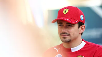 BAHRAIN, BAHRAIN - APRIL 10: Charles Leclerc of Monaco and Scuderia Ferrari looks on in the Paddock