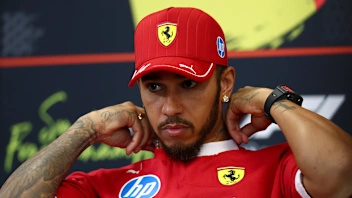 SPA, BELGIUM - JULY 24: Lewis Hamilton of Great Britain and Scuderia Ferrari speaks in the Drivers