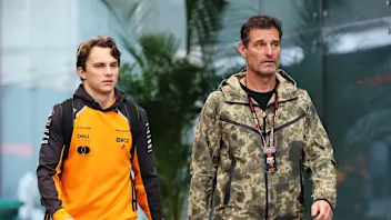 SAO PAULO, BRAZIL - NOVEMBER 08: Oscar Piastri of Australia and McLaren and Mark Webber arrive in