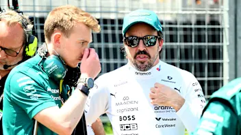 MONTREAL, QUEBEC - JUNE 15: Seventh placed Fernando Alonso of Spain and Aston Martin F1 Team waves