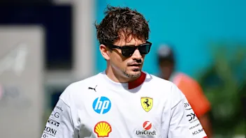 MIAMI, FLORIDA - MAY 01: Charles Leclerc of Monaco and Scuderia Ferrari arrives in the Paddock