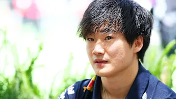 MIAMI, FLORIDA - MAY 01: Yuki Tsunoda of Japan and Oracle Red Bull Racing looks on in the Paddock