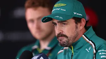 ZANDVOORT, NETHERLANDS - AUGUST 30: Tenth placed qualifier Fernando Alonso of Spain and Aston