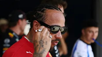 BARCELONA, SPAIN - MAY 30: Lewis Hamilton of Great Britain and Scuderia Ferrari looks on during