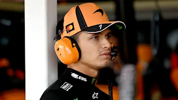 MELBOURNE, AUSTRALIA - MARCH 07: Lando Norris of Great Britain and McLaren looks on in the garage