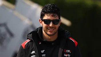 SUZUKA, JAPAN - MARCH 29: Esteban Ocon of France and Haas F1 looks on in the Paddock prior to the