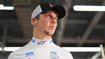 SUZUKA, JAPAN - MARCH 29: Liam Lawson of New Zealand and Visa Cash App Racing Bulls looks on prior