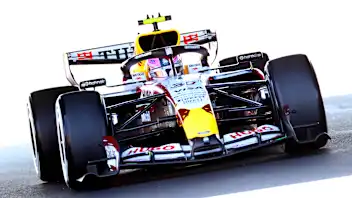 SUZUKA, JAPAN - MARCH 27: Fans of Lando Norris of Great Britain and McLaren and Lewis Hamilton of