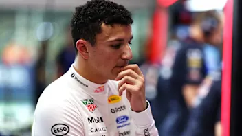 SINGAPORE, SINGAPORE - OCTOBER 10: Isack Hadjar of France and Oracle Red Bull Racing looks dejected