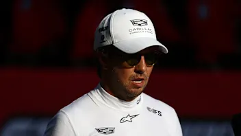 BAKU, AZERBAIJAN - SEPTEMBER 25: Twentieth placed qualifier Sergio Perez of Mexico and Cadillac F1