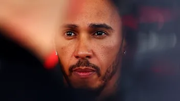 KUALA LUMPUR, MALAYSIA - OCTOBER 01: Lewis Hamilton of Great Britain and Scuderia Ferrari talks to