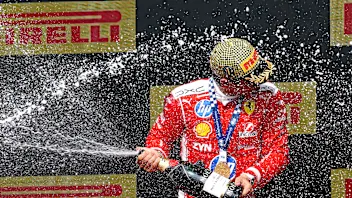 NORTHAMPTON, ENGLAND - JULY 05: Race winner Charles Leclerc of Monaco and Scuderia Ferrari sprays