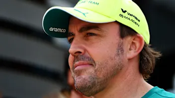 BUDAPEST, HUNGARY - JULY 23: Fernando Alonso of Spain and Aston Martin F1 Team walks in the Paddock
