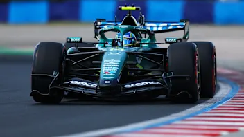 BUDAPEST, HUNGARY - JULY 25: Fernando Alonso of Spain driving the (14) Aston Martin F1 Team AMR26