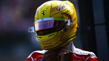 BUDAPEST, HUNGARY - JULY 25: Second placed qualifier Lewis Hamilton of Great Britain and Scuderia