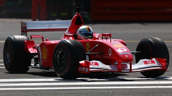 MONZA, ITALY - SEPTEMBER 06:  Sebastian Vettel drives a historic Ferrari the Michael Schumacher