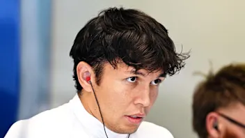 MONZA, ITALY - SEPTEMBER 04: Alexander Albon of Thailand and Williams looks on in the garage during